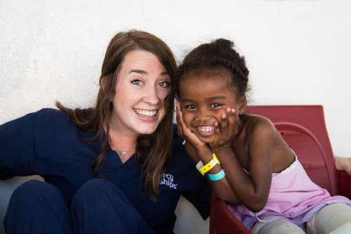 ©2015 Mercy Ships - Photo Credit Katie Keegan - Ward Nurse Jarah Nordin (USA) plays with Stivanna of Madagascar on Deck 7